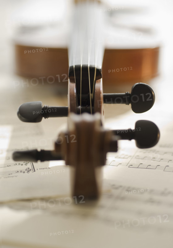 Close up of violin bow on sheet music.