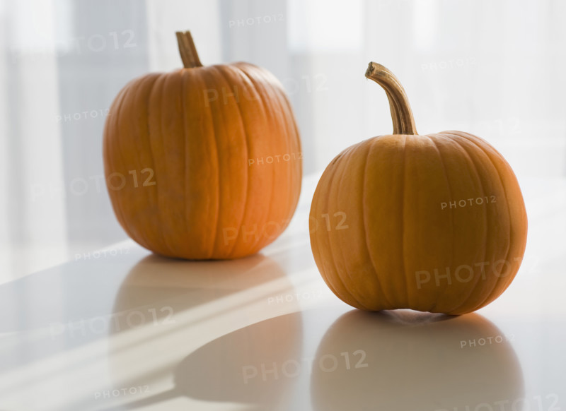 Two pumpkins.