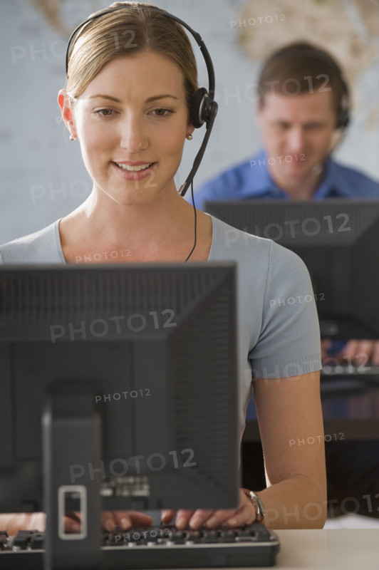 Call center employees working.