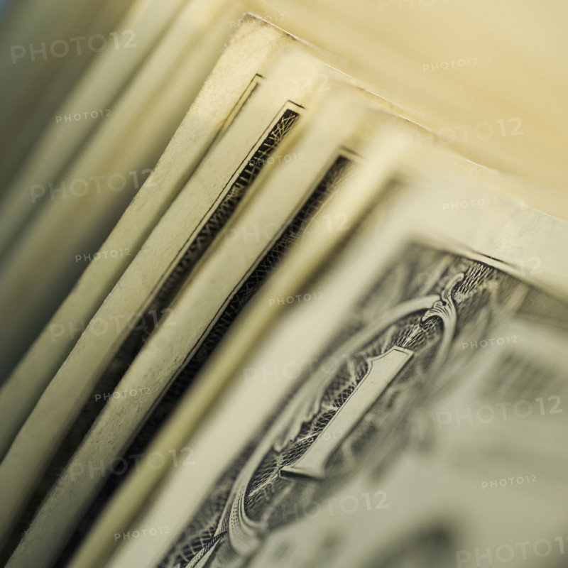 Close up of one dollar bills.