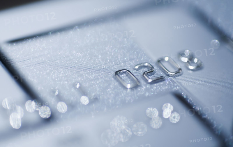 Close up of numbers on credit card.