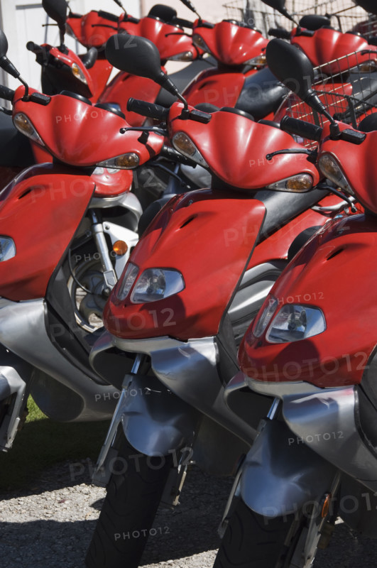 Parked scooters.