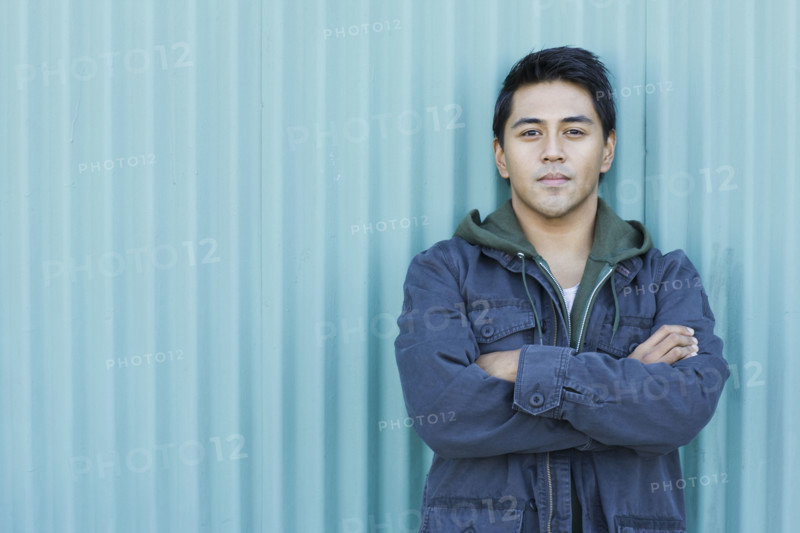 Man posing with arms crossed. Date : 2008