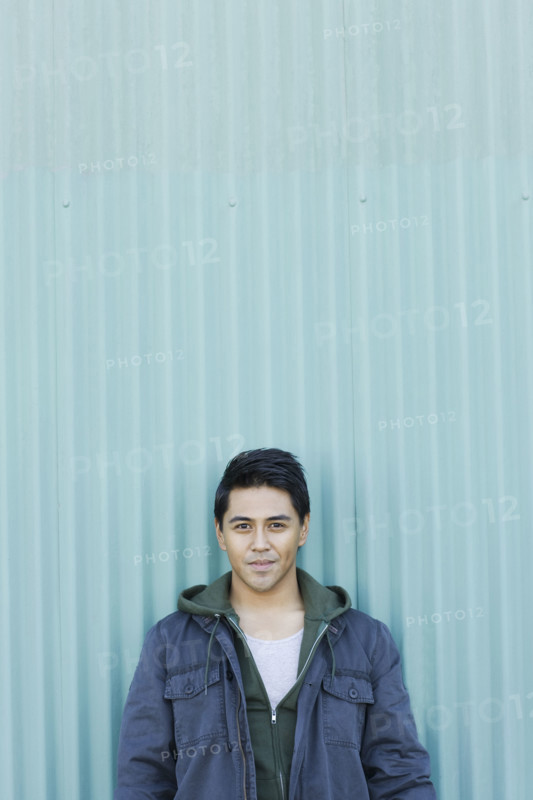 Man posing against wall. Date : 2008