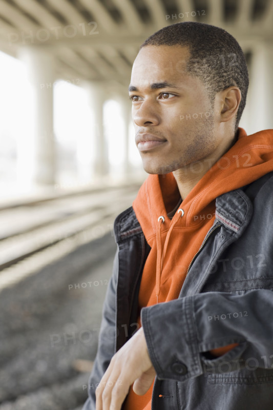 Portrait of young man looking pensive. Date: 2008