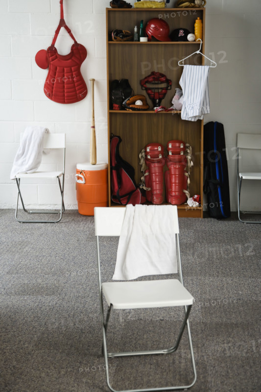 Baseball equipment in locker room. Date: 2008