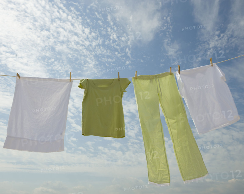 Clothes hanging from clothesline.