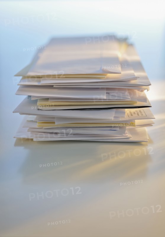 Stack of mail.