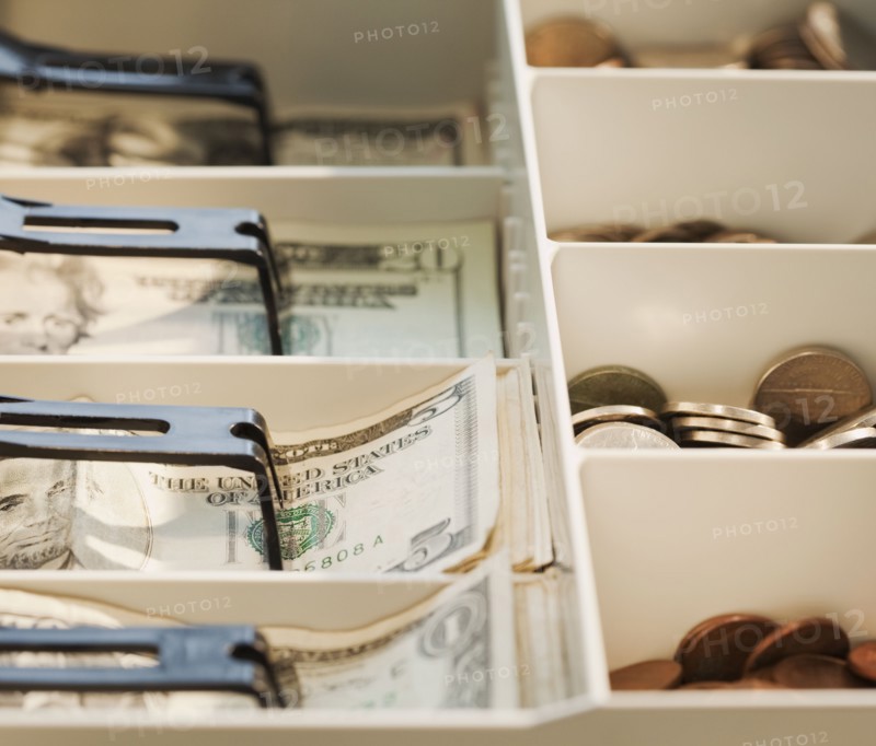 Rolls of cash. Photographe : Jamie Grill
