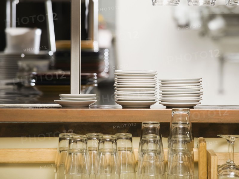 Clean dishes in restaurant.