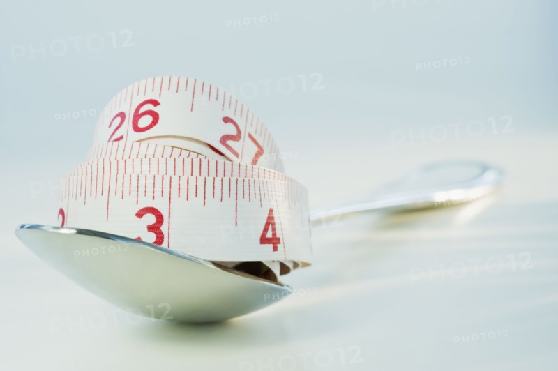 Tape measure on spoon. Photographe : Daniel Grill