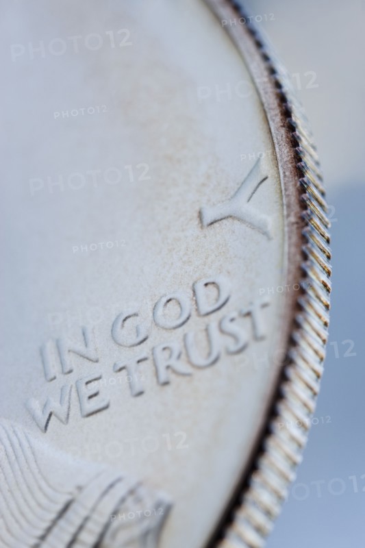 Close up of silver coin.