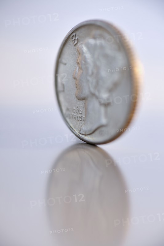 Close up of silver coin.