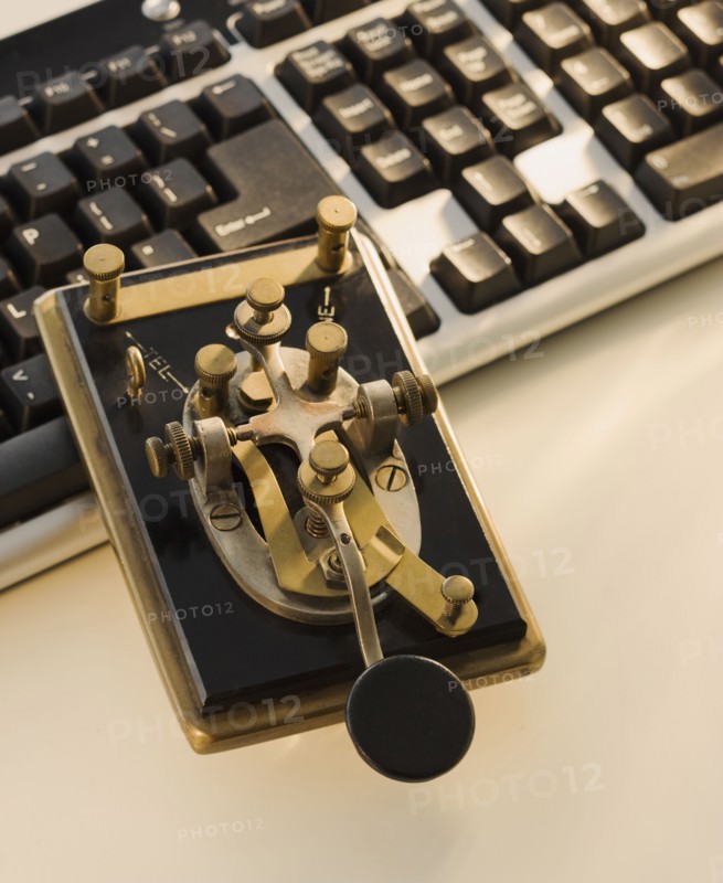 Antique telegraph key and keyboard.