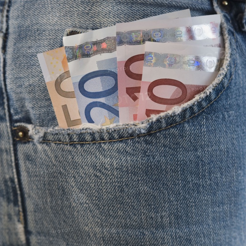 Assorted euro notes in pocket.