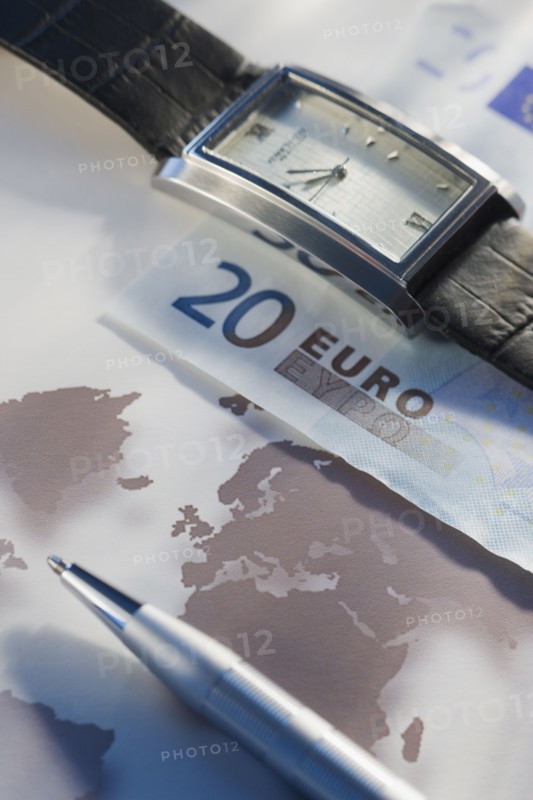 Euros and wristwatch.