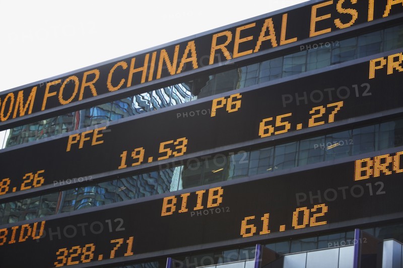 Stock ticker board. Photographe : fotog