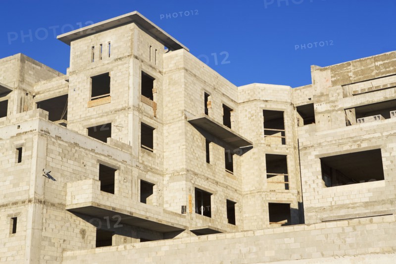 Brick building under construction. Photographe : fotog
