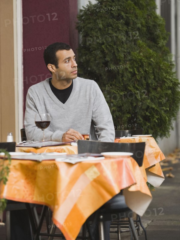 Man waiting for date in restaurant.