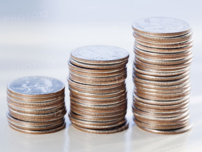 Stacks of coins. Photographe : Jamie Grill