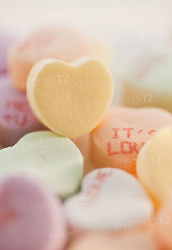 Close up of candy hearts.