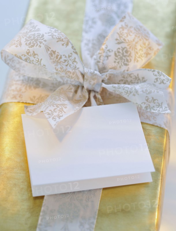 Gift with ribbon and card.