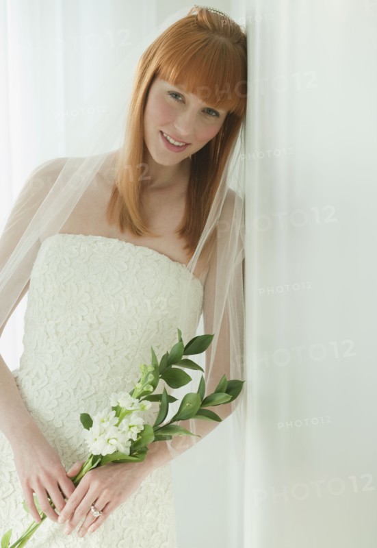 Bride in wedding dress.