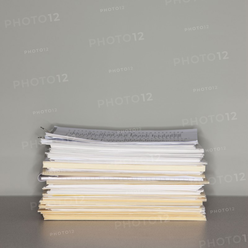 Stack of paperwork.