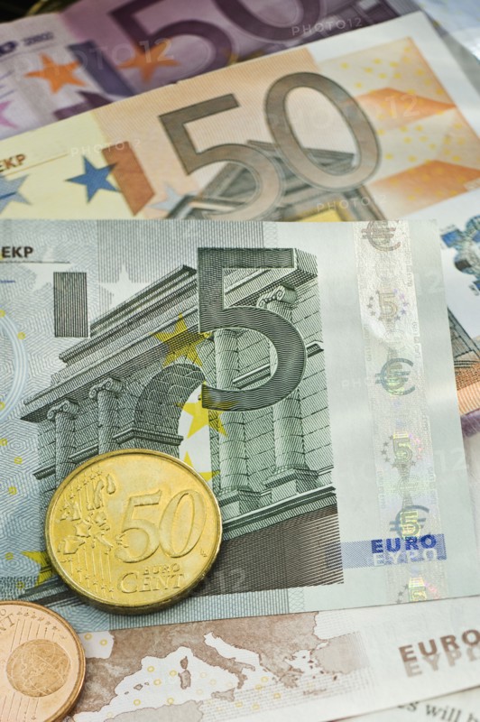 Assorted euro notes and coins.