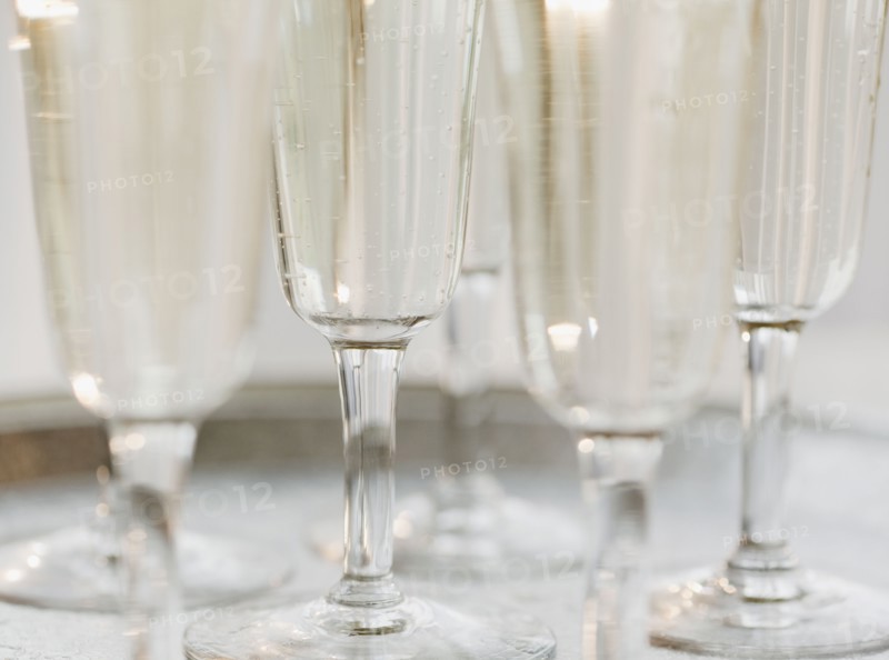 Glasses of champagne, close-up, still life. Photographe : Jamie Grill