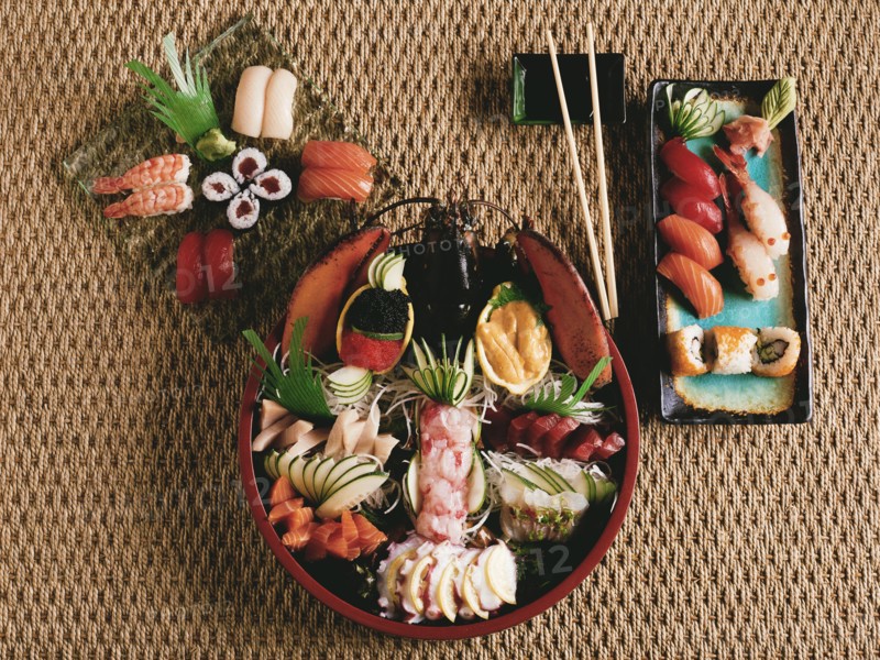 spread of sushi, sashimi &  rolls