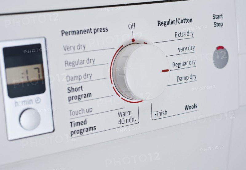 Close up of Dial on Washing Machine.