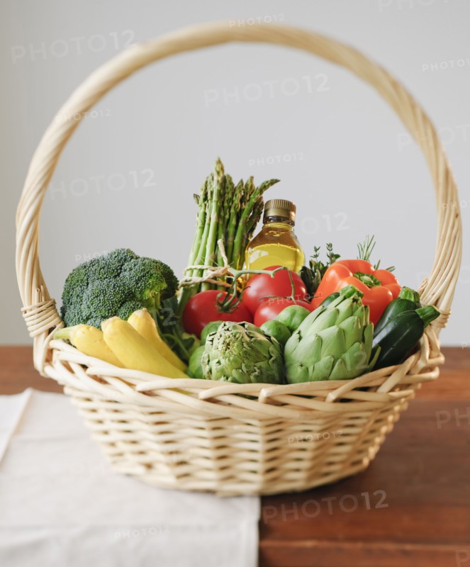 Wicker basket filled with vegetables.