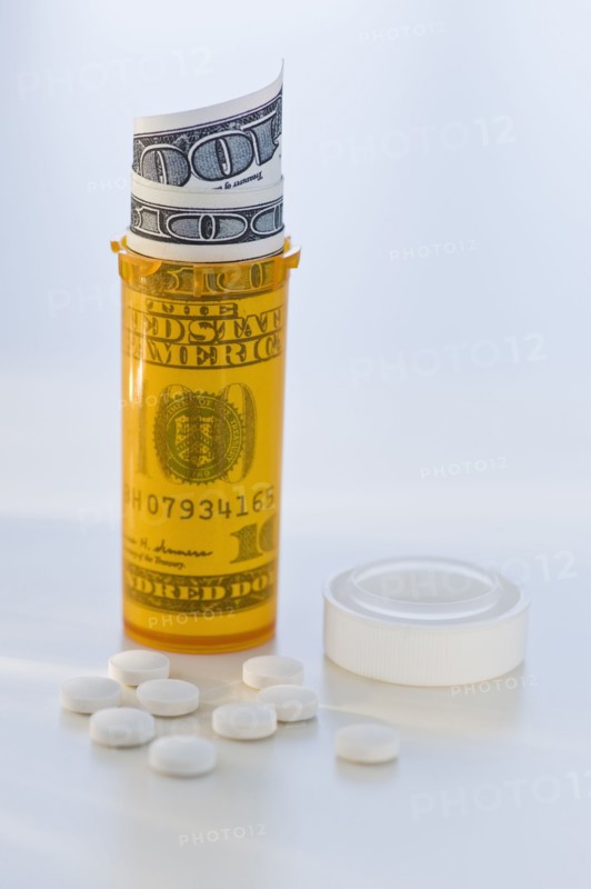 Pill bottle with bank notes