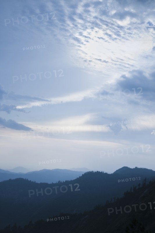 Mountain landscape with trees.