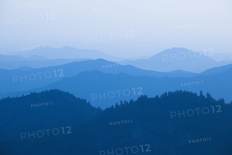 Mountain landscape with trees.