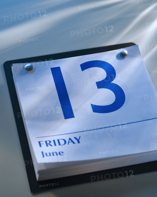A calender showing Friday the thirteenth.