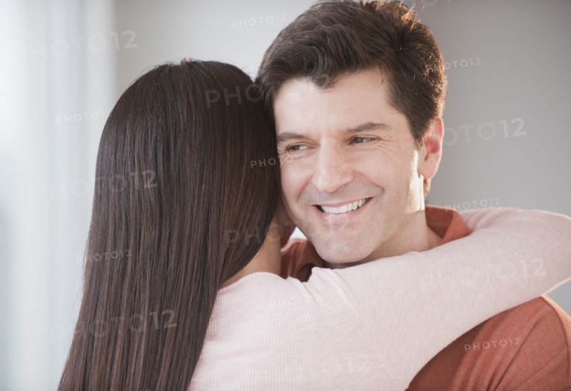 A couple hugging.