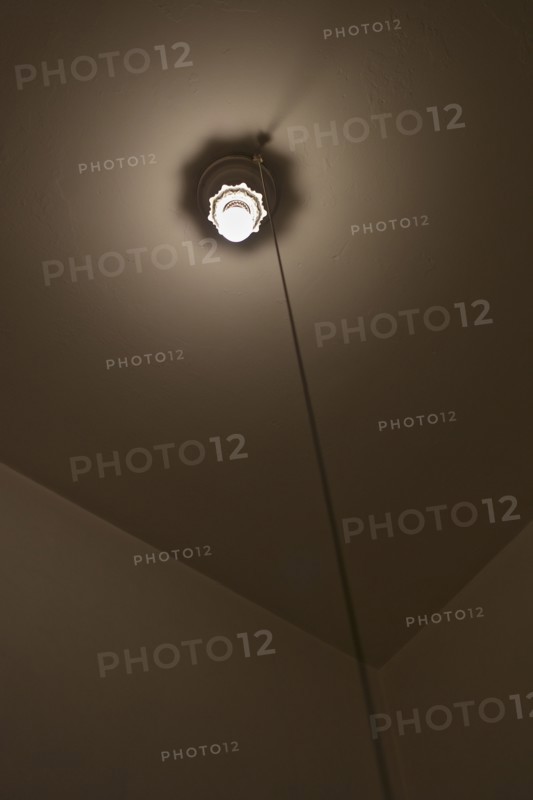 A lightbulb in a room.
