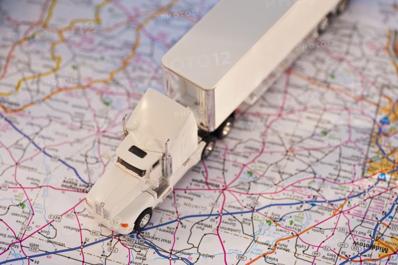 A toy truck on a map