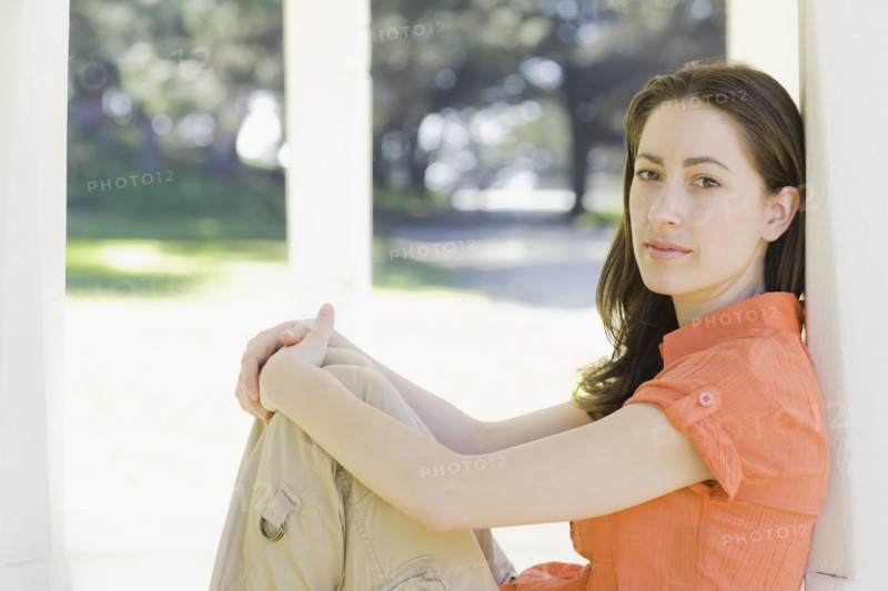 A woman at a park relaxing