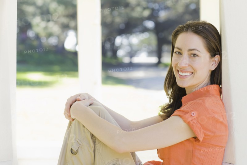 A woman at a park relaxing