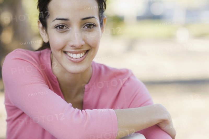 A woman outdoors smiling