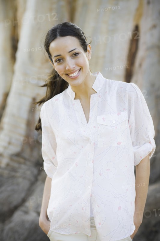 A woman outdoors smiling
