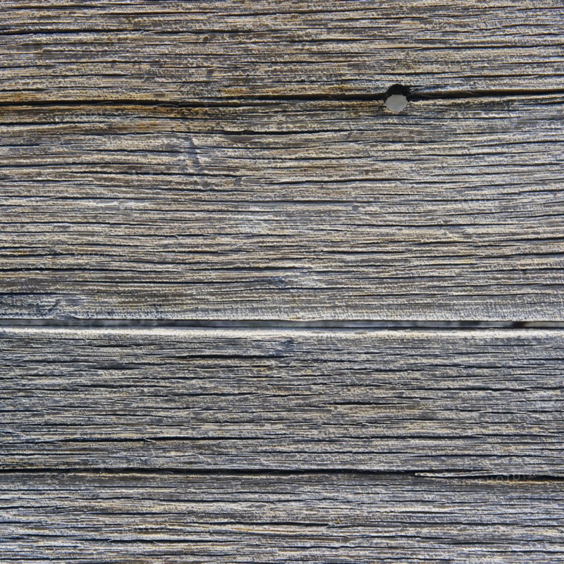 A wooden surface.