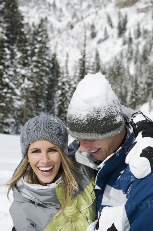 A couple outdoors in the snow