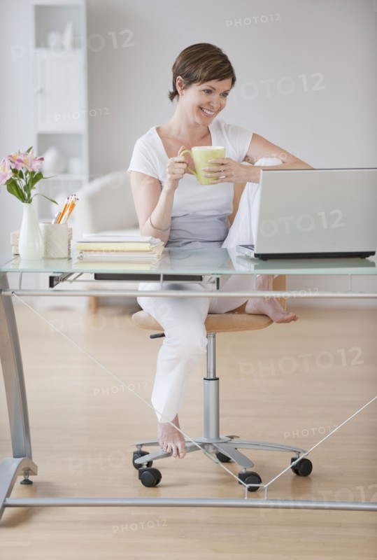 Woman at laptop.