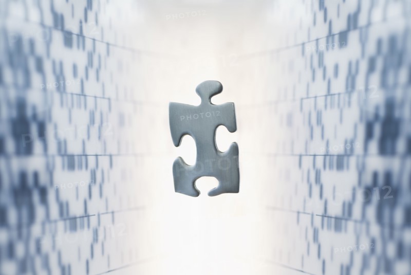 Puzzel piece against medical background.