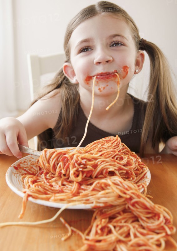 Child eating spaghetti