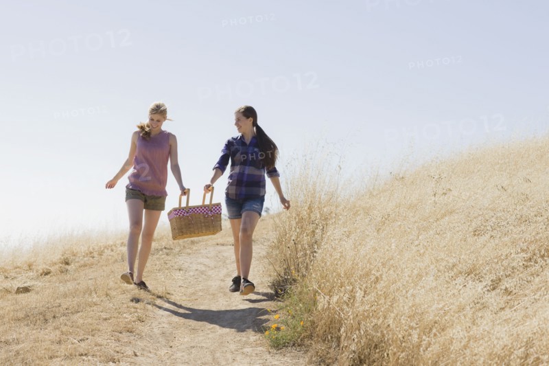 Freinds walking to picnic